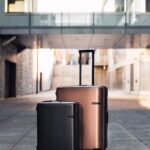 black and copper hard case luggage