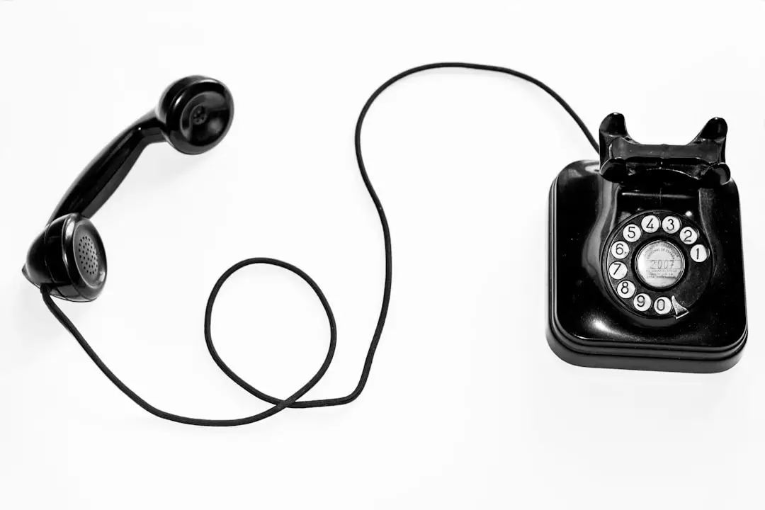 …aquellos tiempos by Case Brands photo of black rotary phone against white background