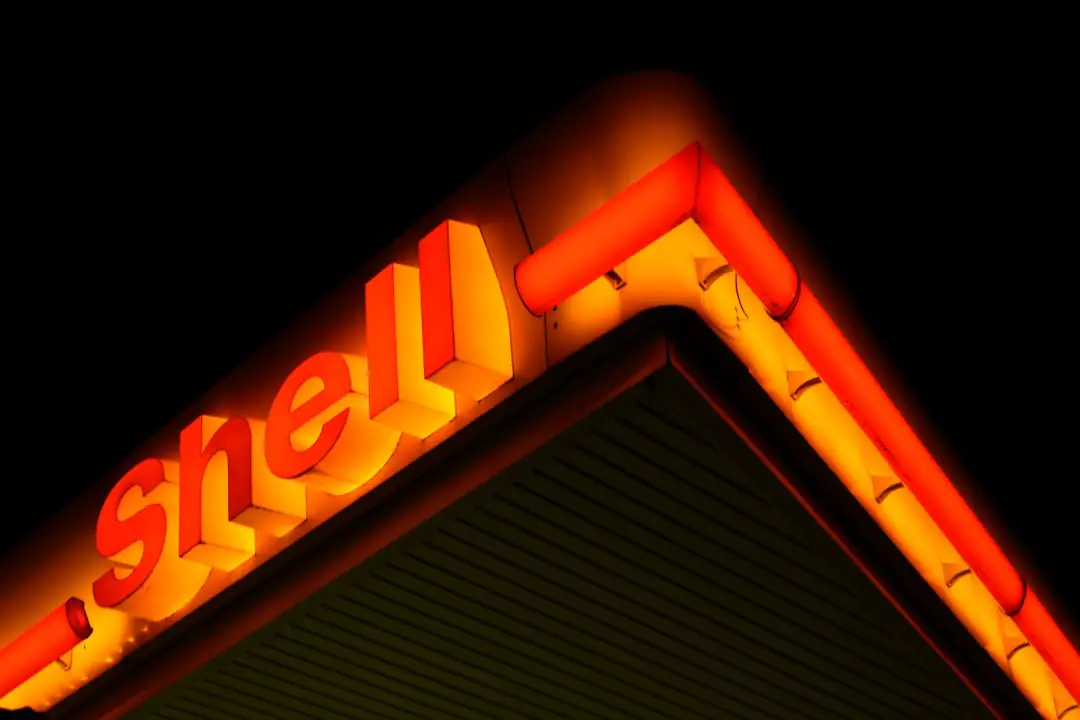 Frequently Asked Questions (FAQ) About Hard Shell Suitcases ❓ by Case Brands low angle photography of Shell gas station at night
