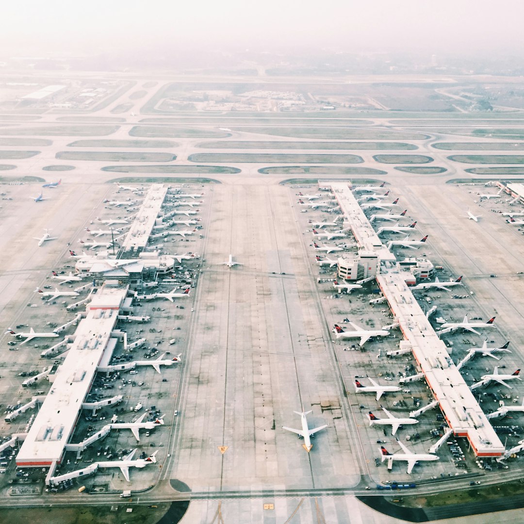 🎉 Conclusion: Which Hard Suitcase Wins Your Next Adventure? by Case Brands aerial view of airport with lots of airplanes during daytime