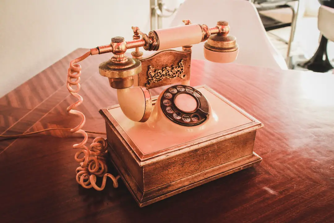 Conclusion: Should You Buy a Casetify Case Despite Yellowing Concerns? 🤔✅ by Case Brands white and brown rotary telephone on brown wooden table