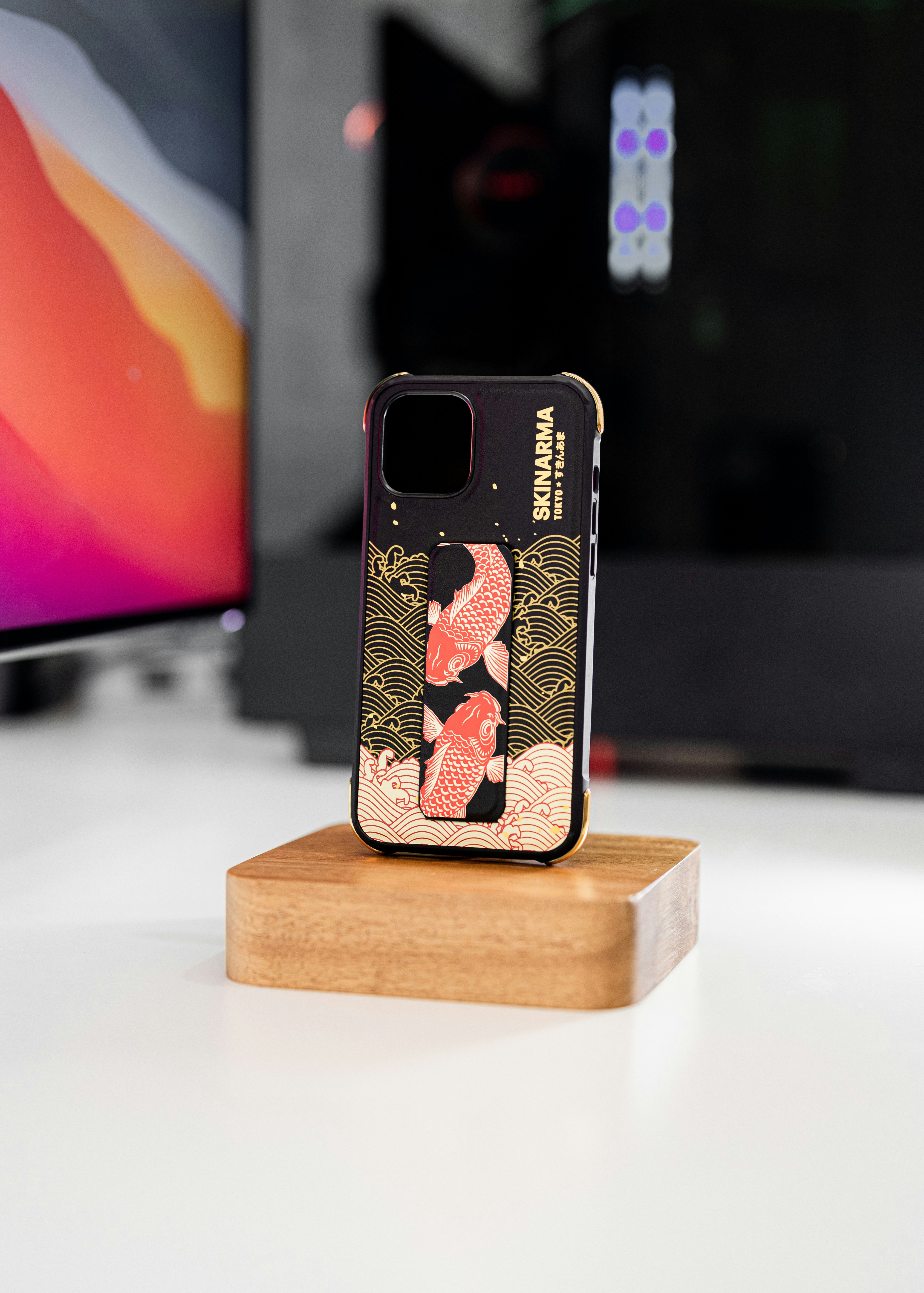 a phone case sitting on top of a wooden stand