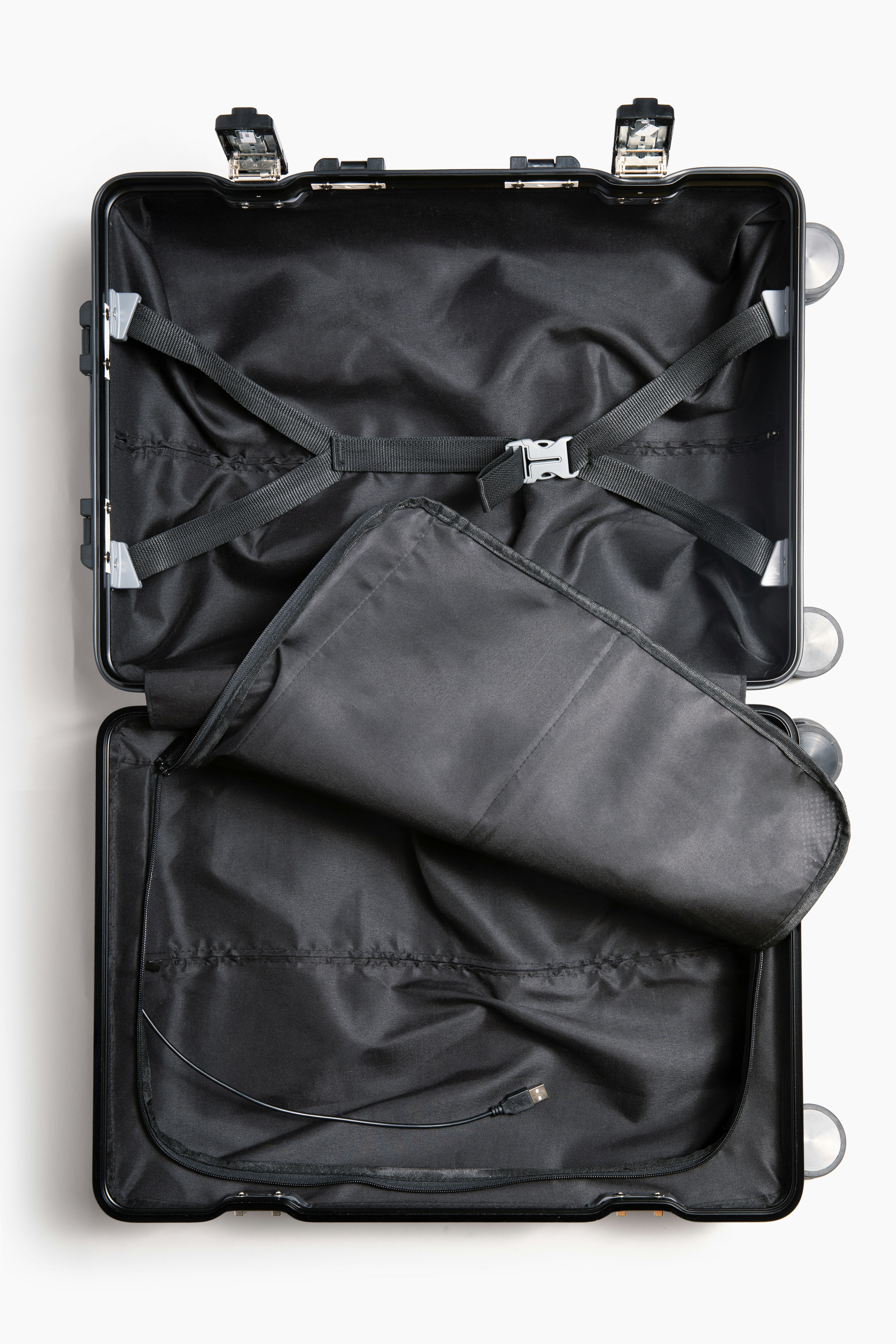 a suit case is open on a white surface